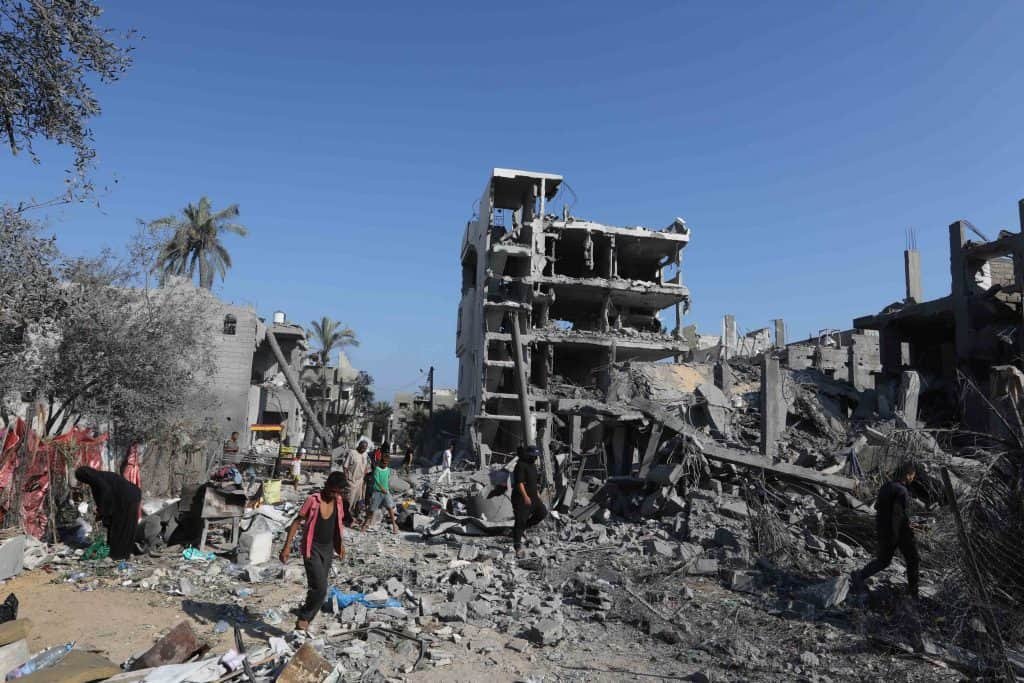 The Palestinians inspect their homes destroyed after an Israeli aerial strike in the midst of an intense combat between Israel and Hamas, in the center of the Gaza Strip on August 7, 2024.