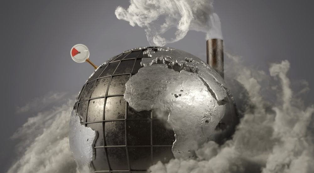 Representation of the metal Earth, with a thermometer on top and smoke coming out of a fireplace installed on top of the metal balloon