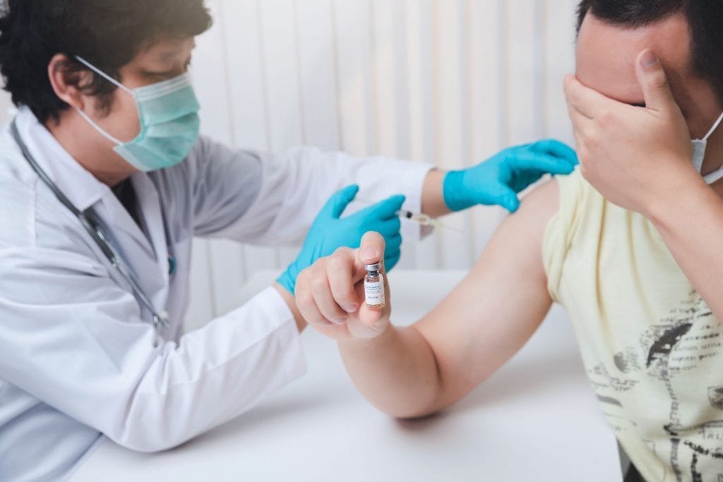 Volunteer participates in Scientific Experiment in the Laboratory