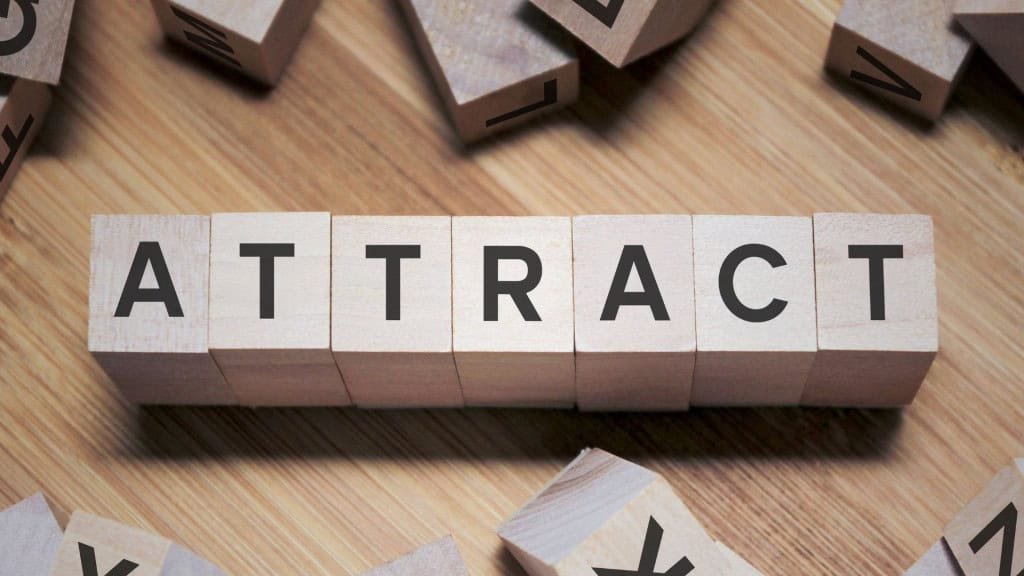 Attracts a word written in wooden cube