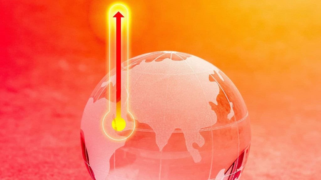 Redddar orange thermometer in front of the graphic representation of the Earth